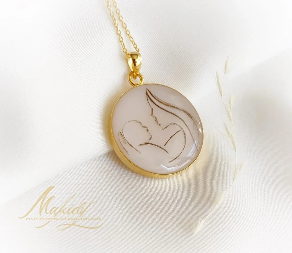 Nobu breast milk jewellery with family-baby design